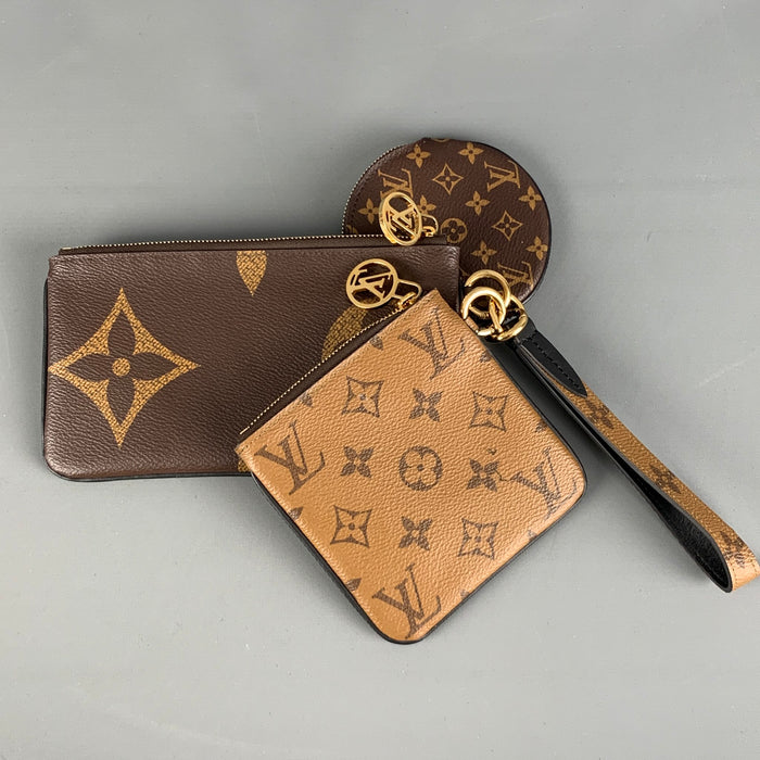 LOUIS VUITTON Bolso de lona revestido con monograma marrón beige