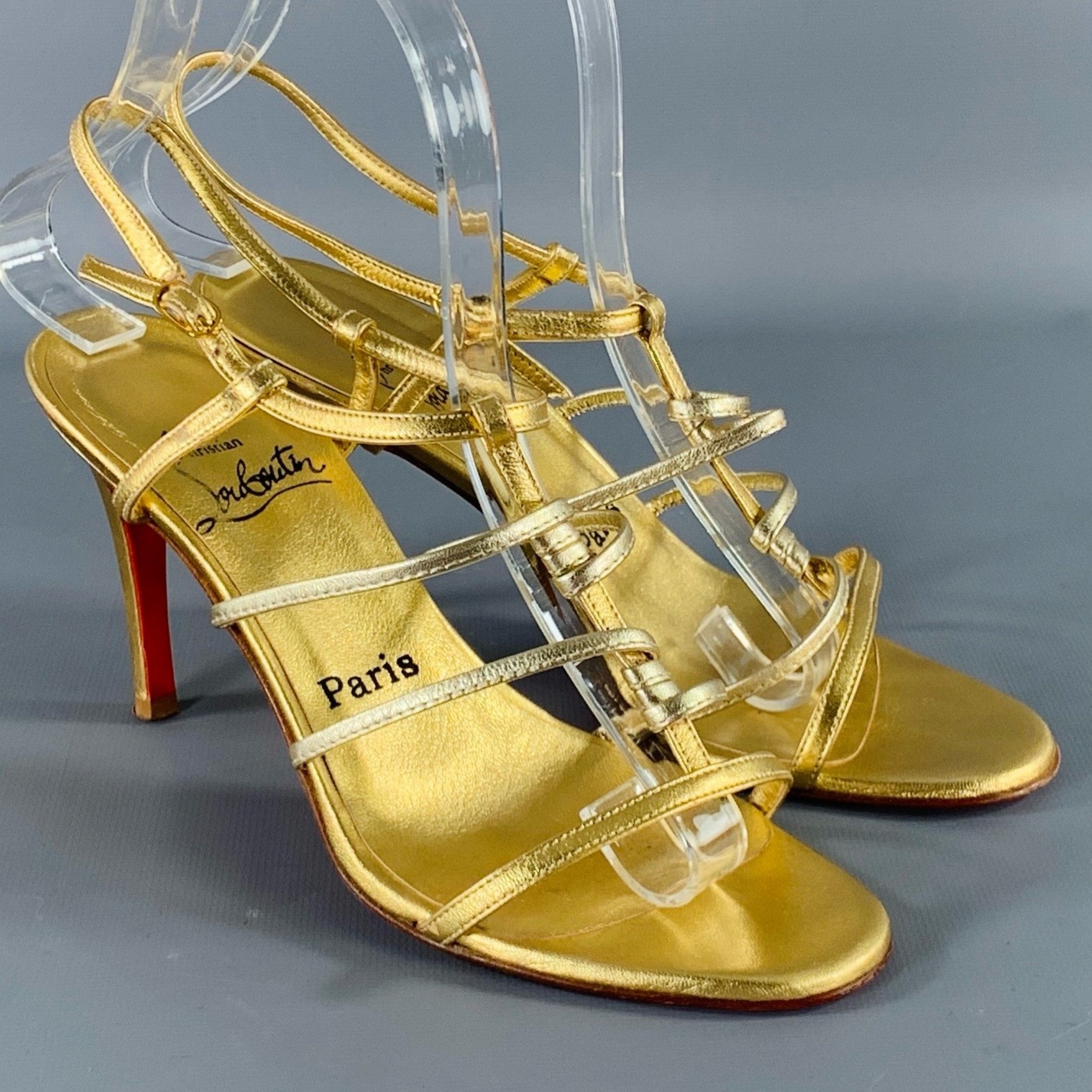 Louboutin gold sandals best sale