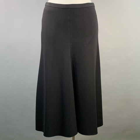 Front close-up of the black matching skirt showing the waistband and long straight silhouette.