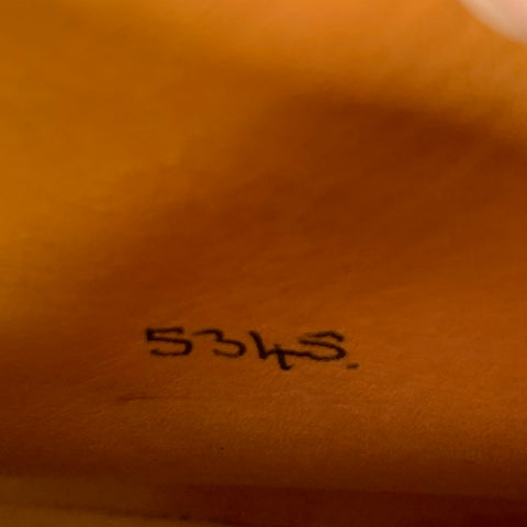 Close-up of size marking 10E inside the boot.