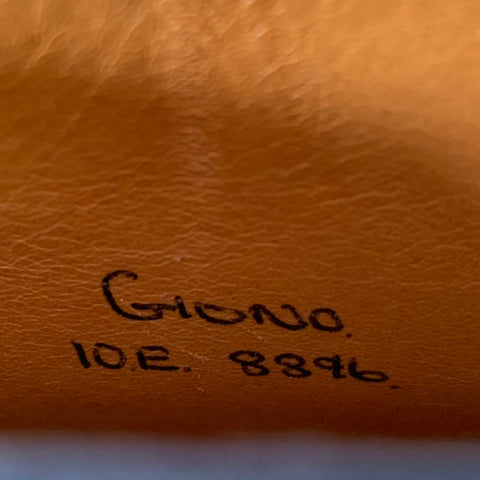 Close-up of interior marking reading Giono 10E 8896.