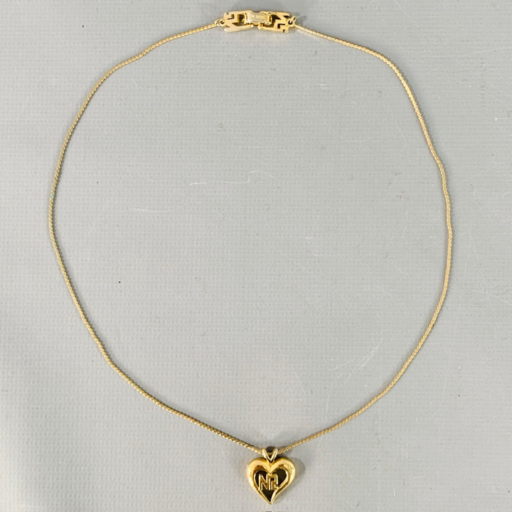 NINA RICCI Gold Metal Heart Monogram Pendant Necklace