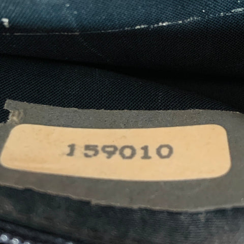 Close-up of interior CHANEL stamp with registered trademark symbol.