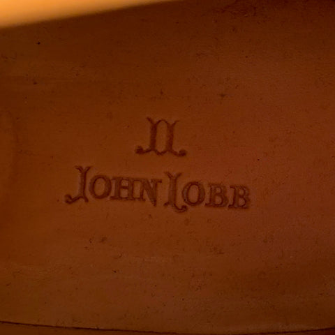 Close-up of JOHN LOBB stamp inside the tan leather lining.