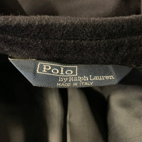Close-up of Polo by Ralph Lauren neck label reading Made in Italy.