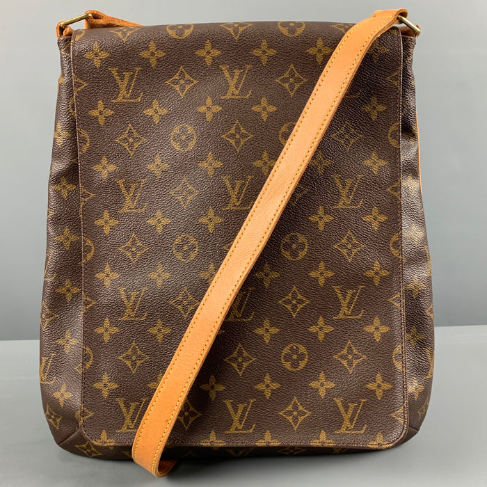 LOUIS VUITTON Bolso de lona revestido con monograma marrón beige