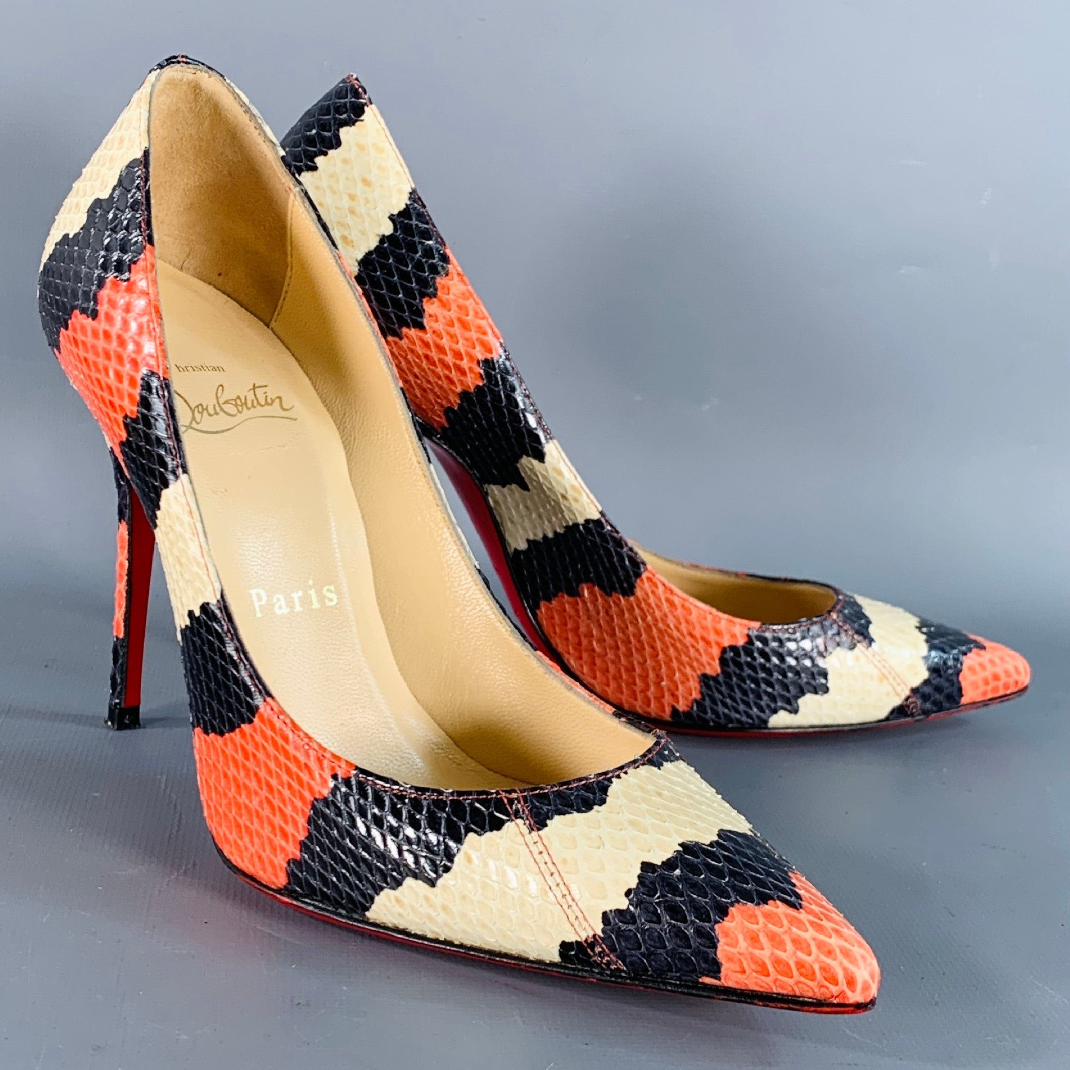 CHRISTIAN LOUBOUTIN Size Orange Black Cream Snakeskin Leather Pointed Toe  Stiletto Pumps