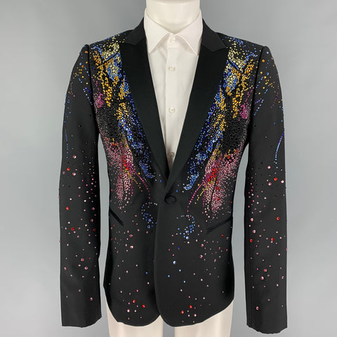 Front view of black Emporio Armani single-button sport coat on mannequin with multicolored beaded embellishments across the chest, lapels, and sleeves.