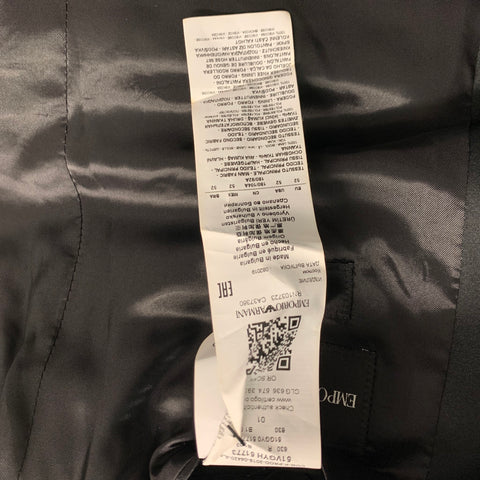 Interior garment label showing Emporio Armani information, made in Bulgaria, and size conversions including USA 42.