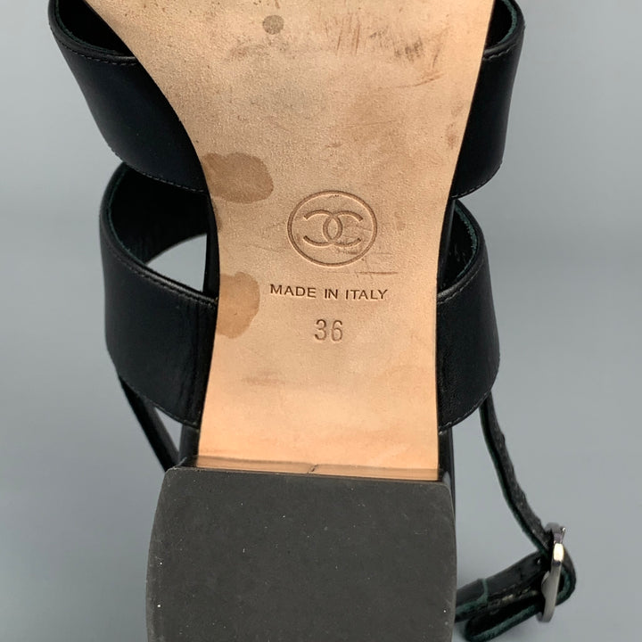 CHANEL Size 6 Black & Silver Leather Turn Lock Logo Chunky Heel Sandals