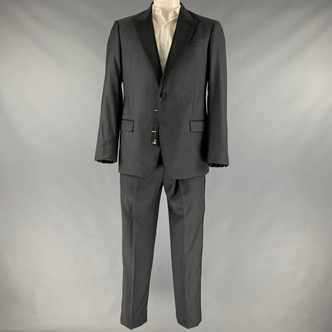 Full front view of grey and black tuxedo set on mannequin, showing jacket and matching trousers.