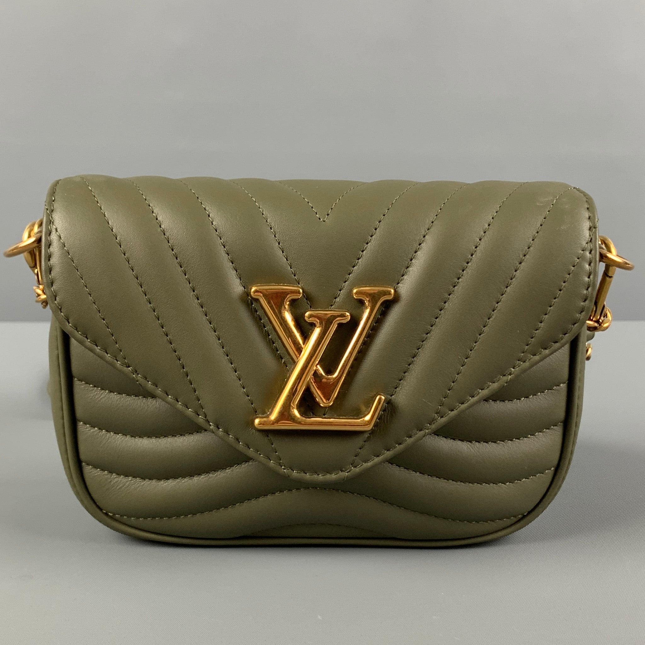 Louis Vuitton New wave multipochette Olive green Patent leather Lambskin  ref.301861 - Joli Closet