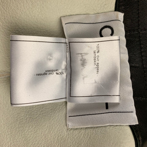 Interior care label stating 100% lambskin in French.