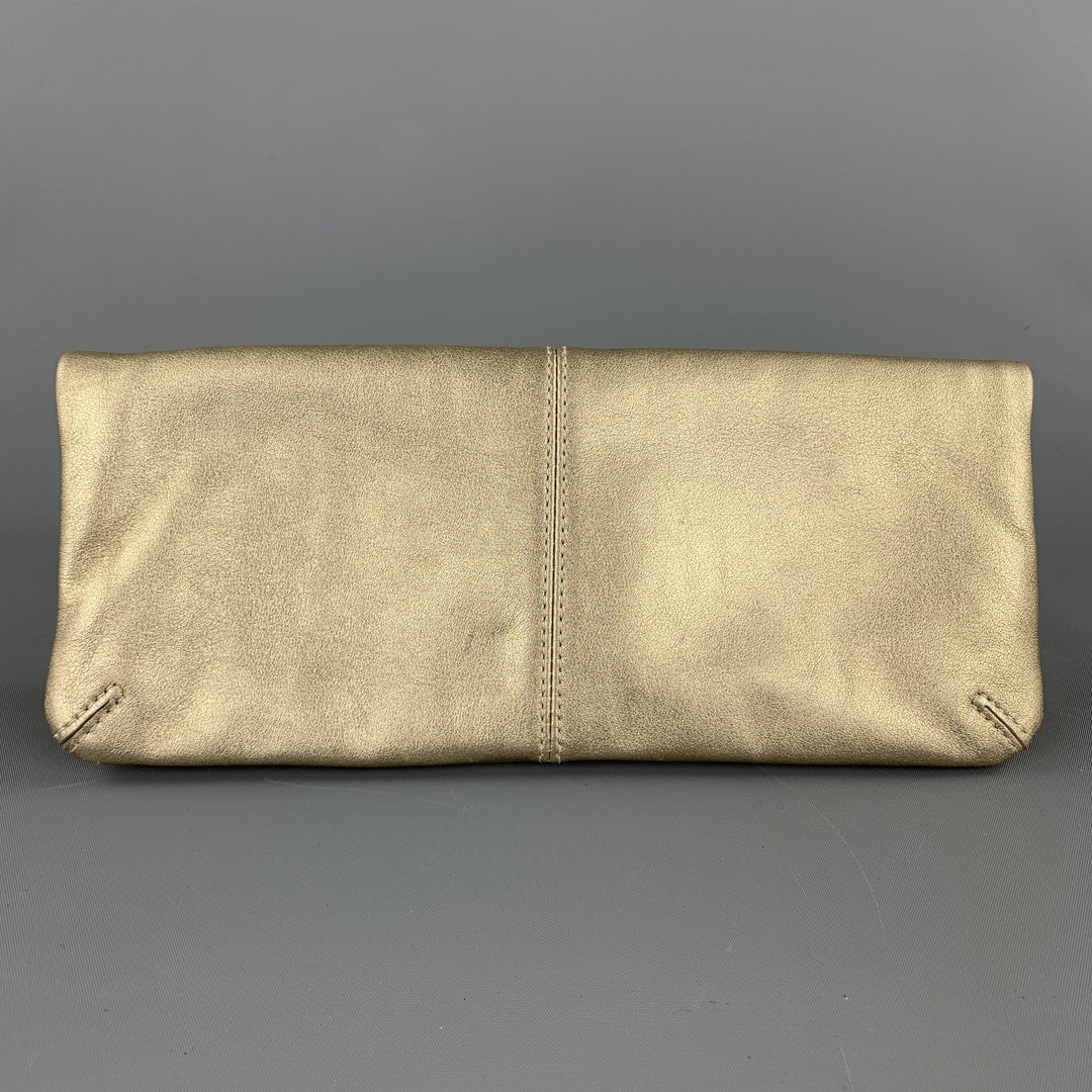 COACH Bolso clutch de cuero dorado