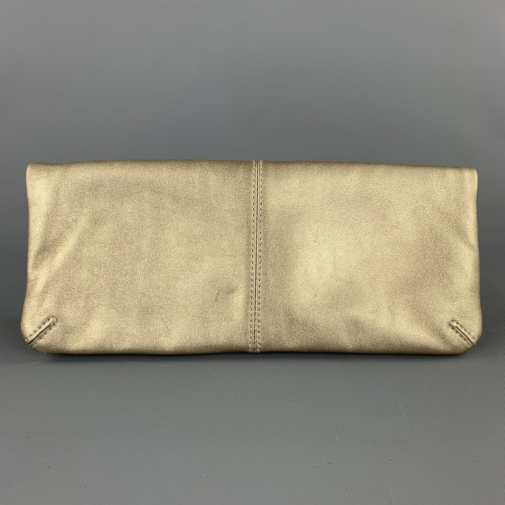 COACH Bolso clutch de cuero dorado