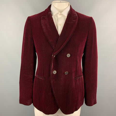 Front view of burgundy and black houndstooth double-breasted sport coat on mannequin.