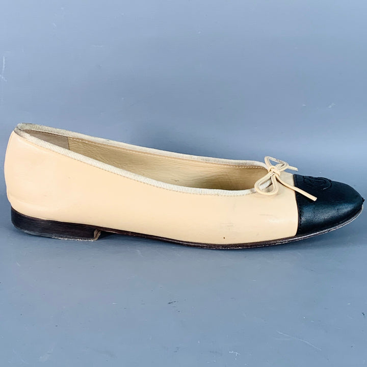 CHANEL Size 9 Beige Black Leather Monogram Cap Toe Flats