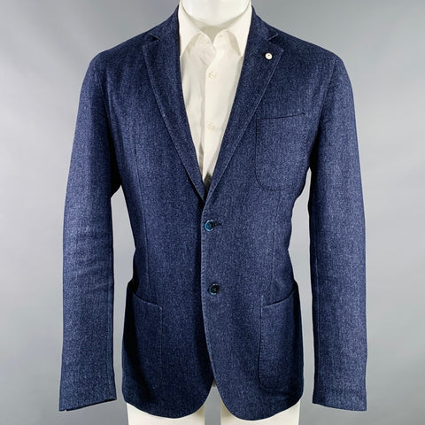 Veste de sport L.B.M. 1911, taille 40, en mélange de laine bleue, coupe droite.