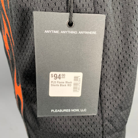 Shorts PLEASURES taille M noir orange en maille polyester avec taille élastique