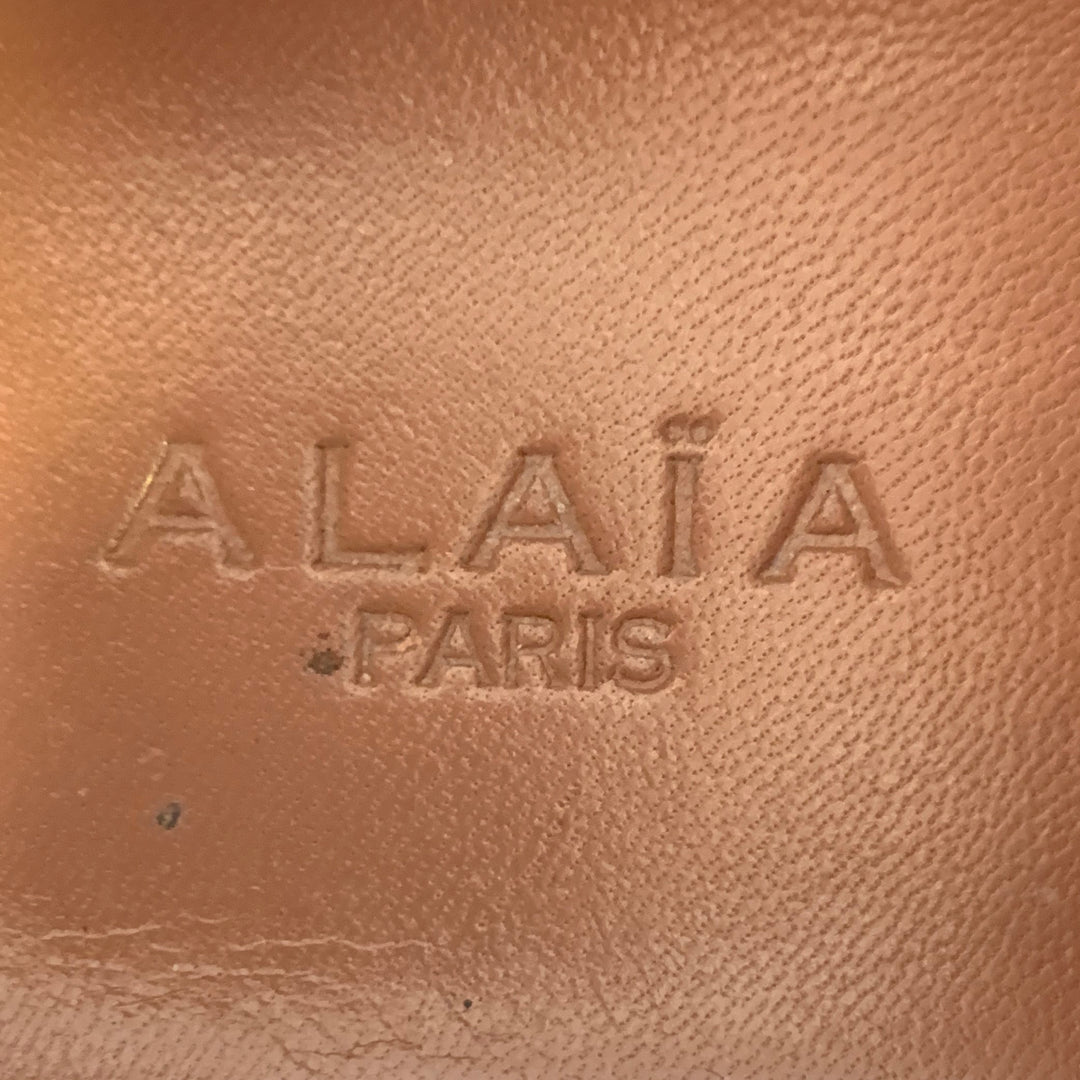 ALAIA Size 9 Black White Perforated Patent Leather Sneakers