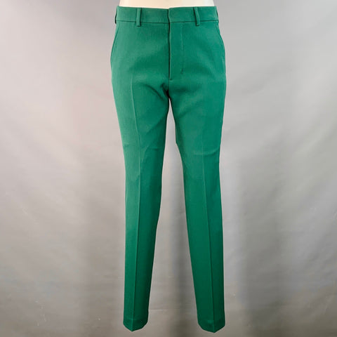 Costume AMI by ALEXANDRE MATTIUSSI en laine verte à revers crantés, taille 38