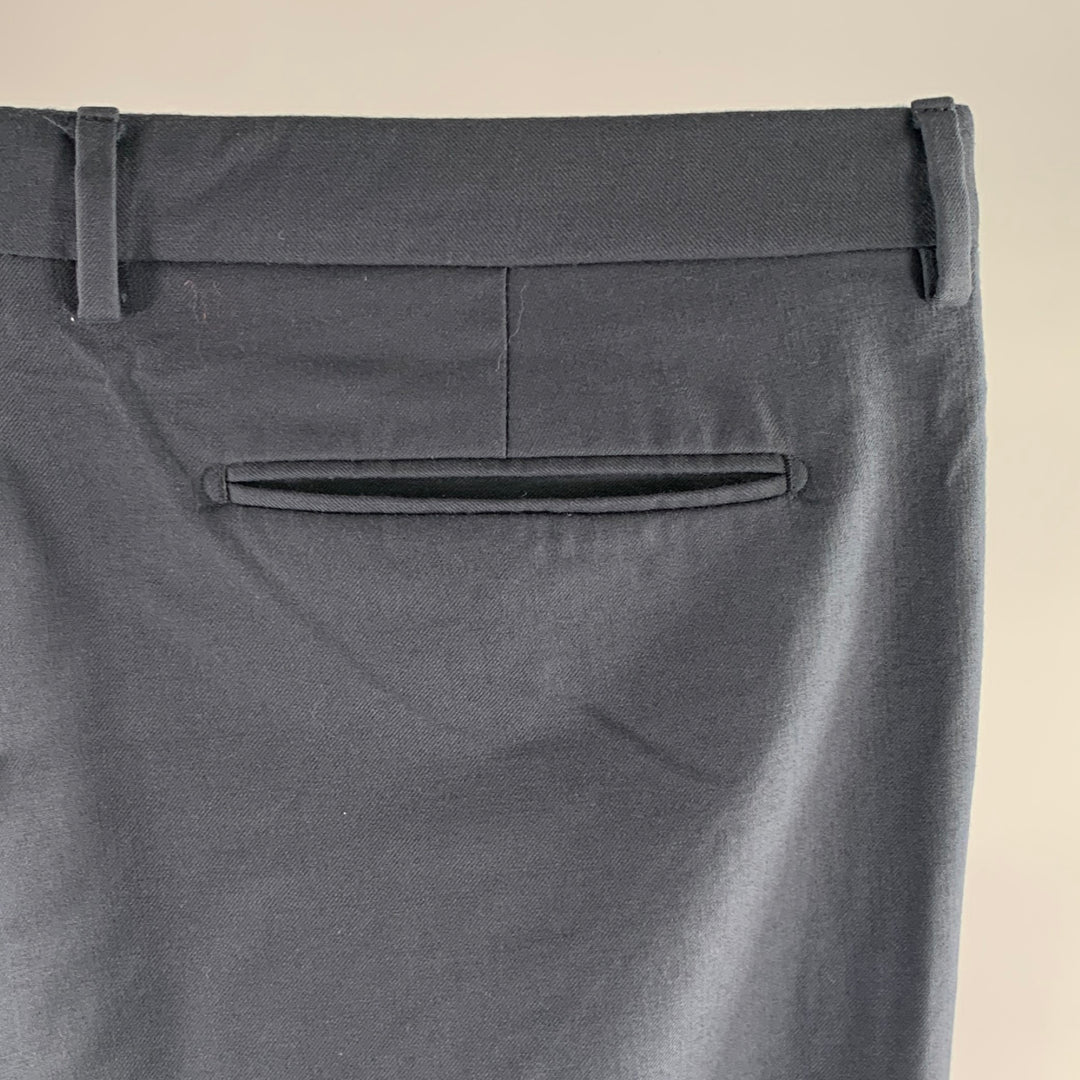DIOR HOMME Pantalon en laine unie marine taille 36