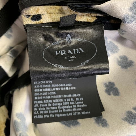 PRADA Robe longue beige et noire en viscose à drapé asymétrique, taille 38