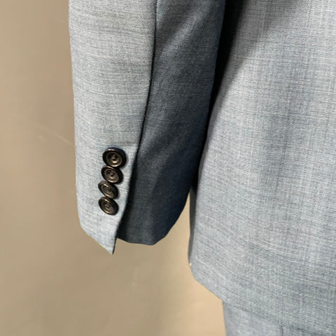 Costume Sartorio taille 44 régulier en laine bleue avec revers cranté