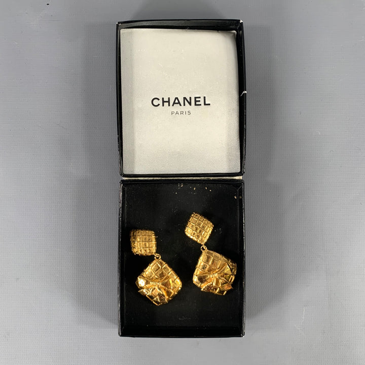CHANEL Gold Tone Diamond Logo Clip-On Earrings