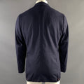 Back view of navy sport coat showing center seam, shoulders, and red stitching at hem corners.