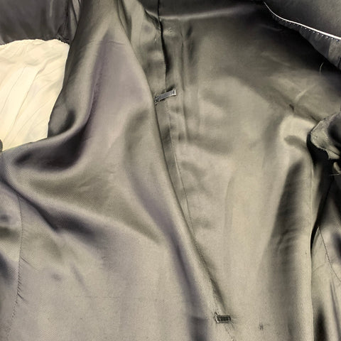 DOLCE & GABBANA Smoking noir en laine vierge et soie mélangées, revers en pointe, taille 48