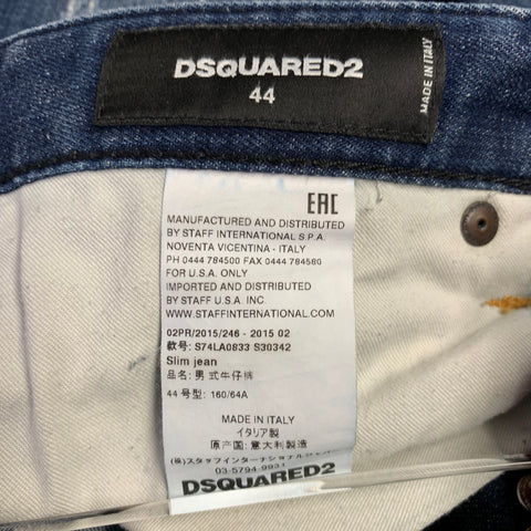 DSQUARED2 Jean slim à braguette boutonnée, bleu et blanc éclaboussé de peinture, taille 28