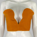 Orange viscose blend velvet corset dress top with a plunging neckline and hook & eye back closure, displayed on a mannequin.