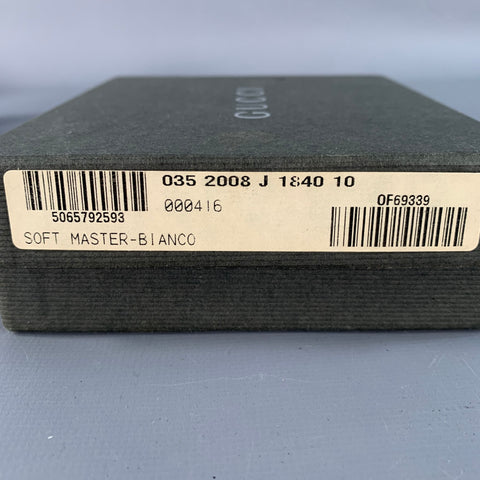 GUCCI Black Embossed Logo Patent Leather Wallet