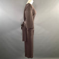 Side view of brown pleated top and wide-leg pants set.