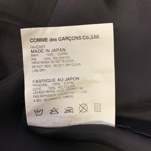 Manteau boutonné COMME des GARÇONS, taille S, en cupro noir