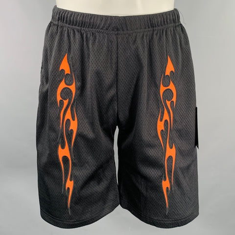 Shorts PLEASURES taille M noir orange en maille polyester avec taille élastique