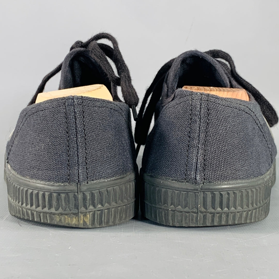 NOVESTA x COMME des GARCONS Size 10 Black Grommets Cotton Canvas Low Top Sneakers