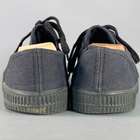 NOVESTA x COMME des GARCONS Size 10 Black Grommets Cotton Canvas Low Top Sneakers