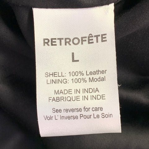 Robe courte bustier RETROFETE taille L en cuir noir et argent cloutée de cristaux