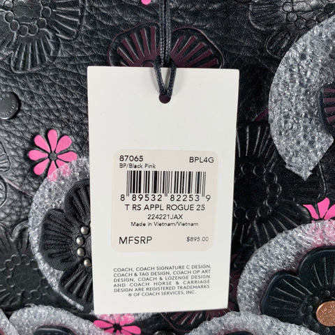Sac à main en cuir noir COACH avec applique florale rose