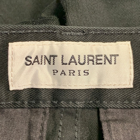 SAINT LAURENT Pantalon décontracté taille 30, coupe slim fuselée, en mélange de coton noir, devant plat