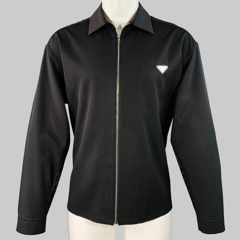 Black jacket with a logo on a gray background