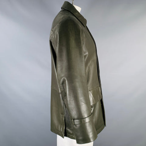 Blouson VINTAGE en cuir vert T 46, fermeture éclair et boutons pression