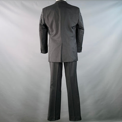 Costume J. LINDEBERG taille 40 coupe classique noir gris en laine, revers en pointe, un bouton