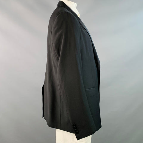 DOLCE & GABBANA Smoking noir en laine vierge et soie mélangées, revers en pointe, taille 48