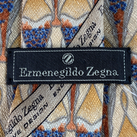 Cravate Ermenegildo Zegna en soie à motifs triangles abstraits beige et bleu