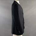 Side view of navy sport coat showing long sleeve, tailored profile, and cuff buttons.