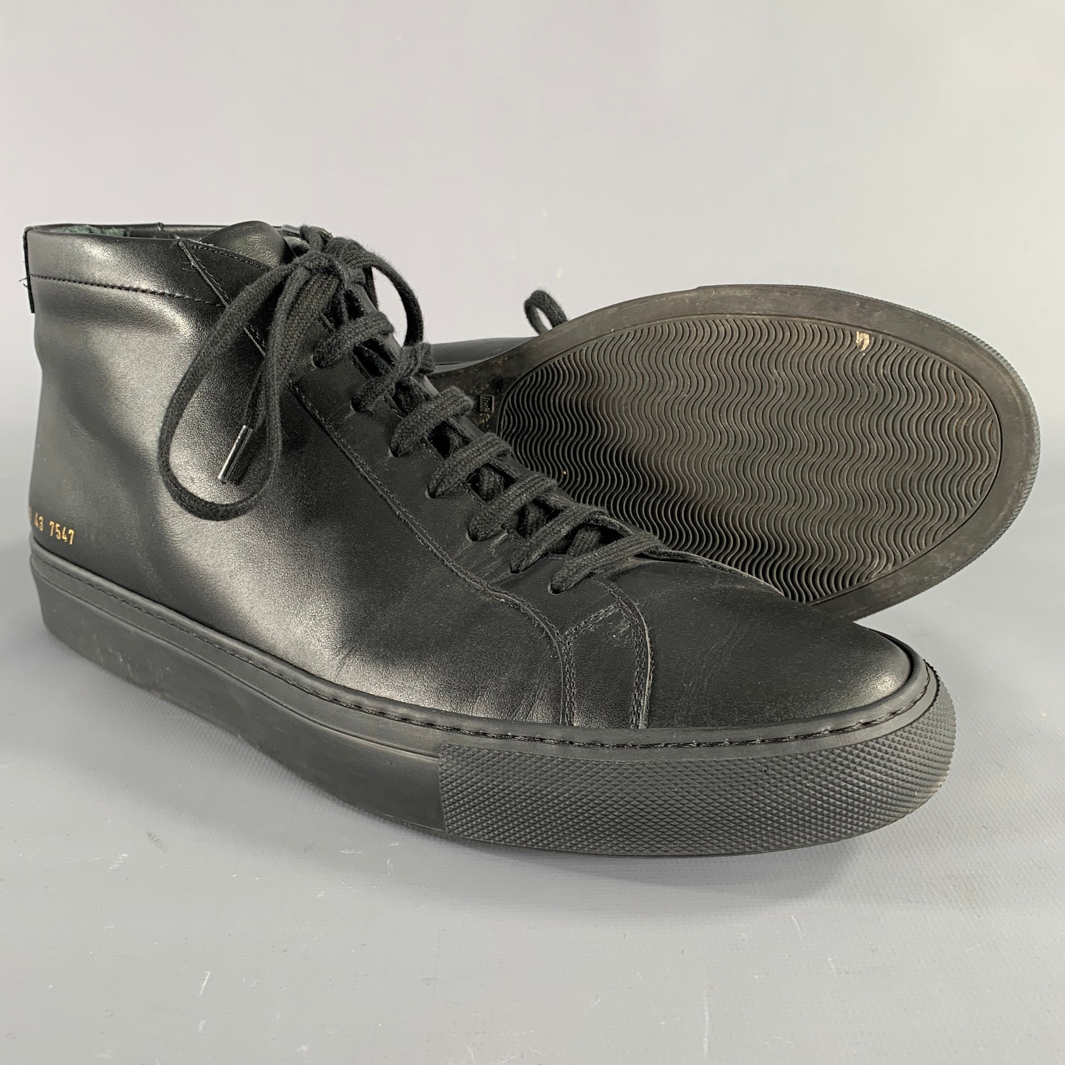 COMMON PROJECTS Size 10 Black Leather High Top Sneakers Sui Generis Designer Consignment