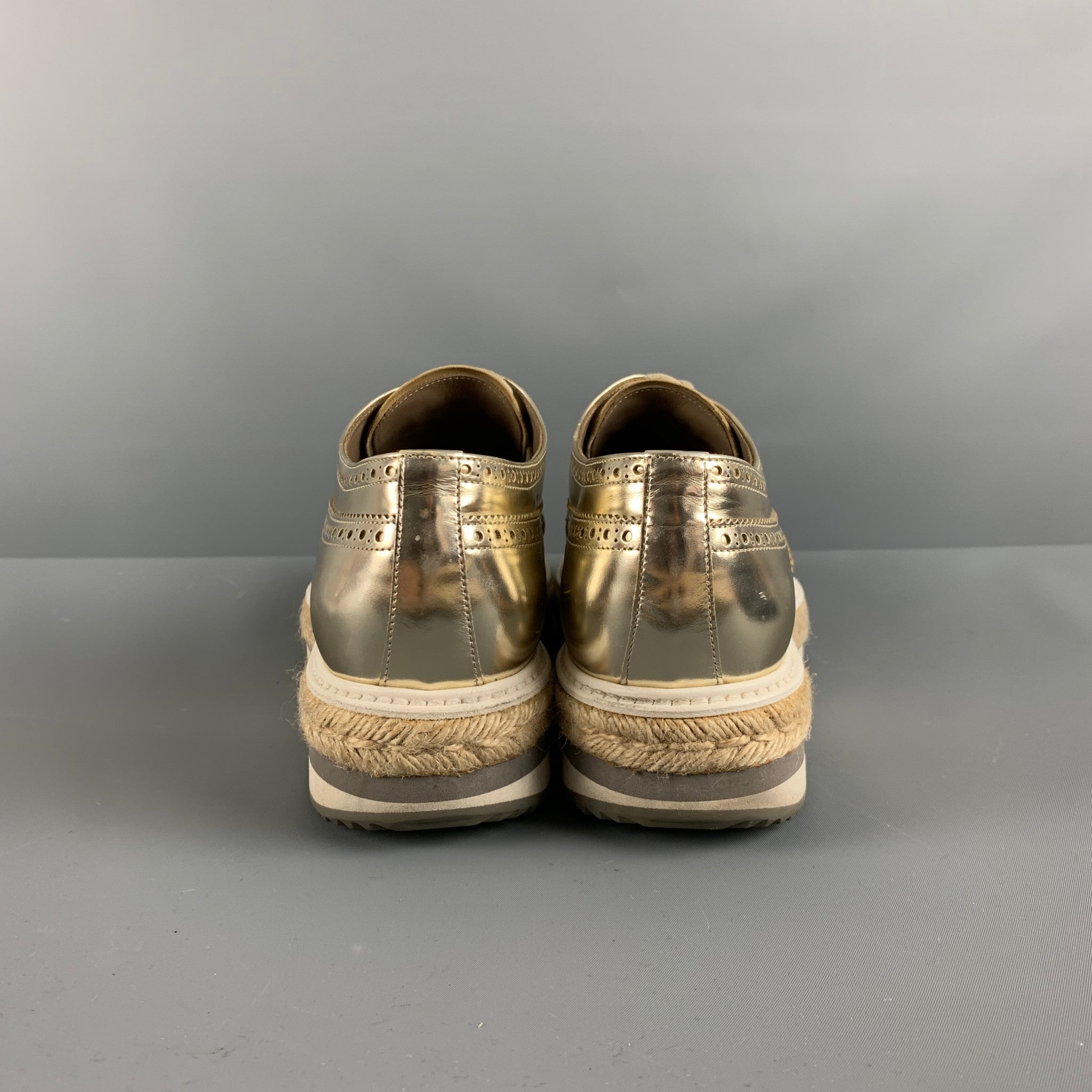 PRADA Size 10 Gold Perforated Leather Platform Lace-Up Shoes – Sui